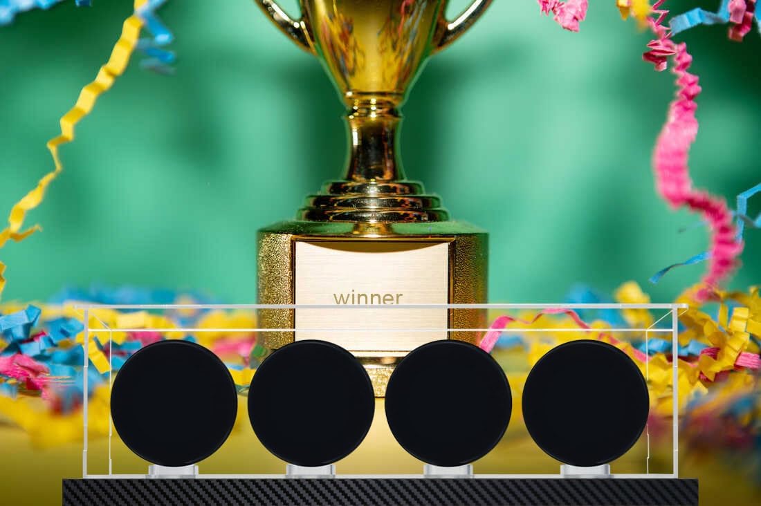 Hockey Puck Display Case for 4 Pack in one, Arcylic Puck Display Holder Stand UV Protected Dustproof Clear Display Cube Free Standing Display Cases with Carbon Fiber Skin Base and Mirror Base