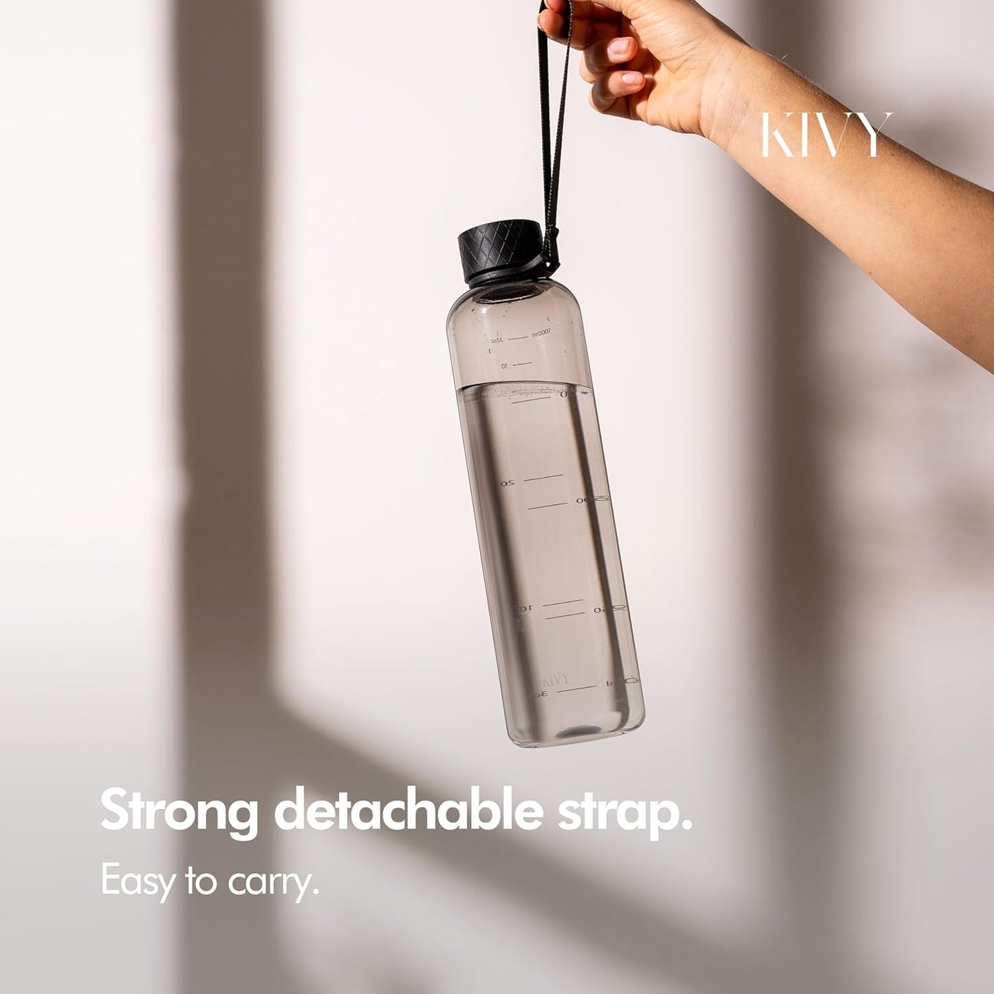 KIVY Slim Water Bottle 32oz [Lightweight & Shatterproof] Fits Backpack & Cupholder for Travel, Sports, School, Gym - Clear water bottle with measurements - Transparent Tritan Black - Dishwasher Safe