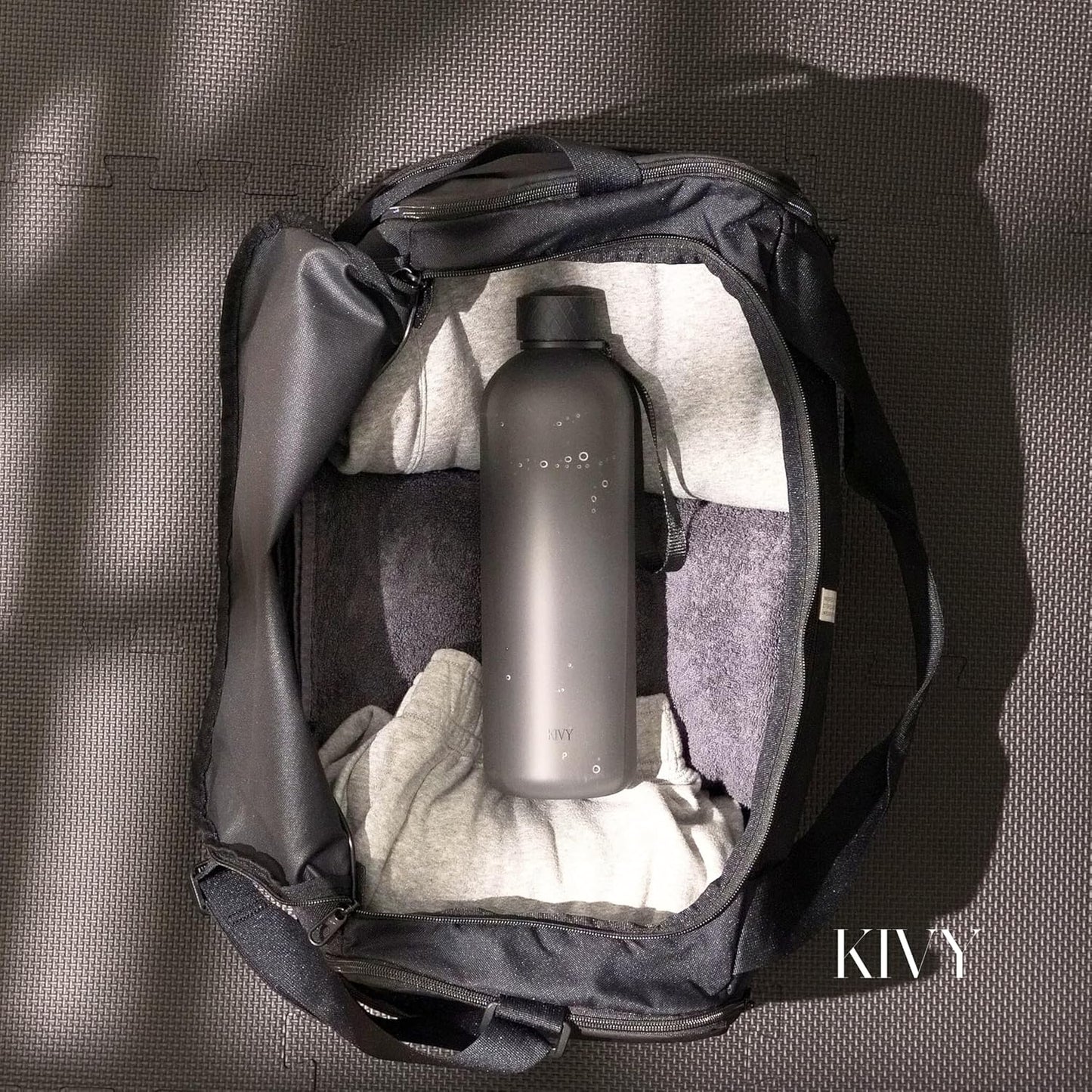 KIVY Large Water Bottle 50oz [Lightweight & Shatterproof] Fits Backpack & Cupholder for Travel, Sports, School - Black water bottle no straw - 1.5 Liter water bottles - 50oz Water bottle