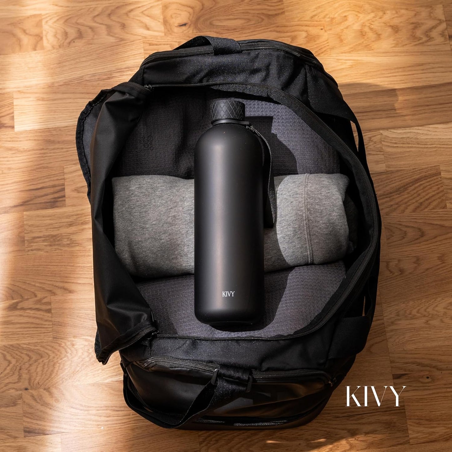 KIVY Slim Water Bottle 50oz [Lightweight & Shatterproof] - Reusable Tritan Water Bottle - Leak Proof Water Bottle for Women & Men - No Spill - Dishwasher Safe - Black