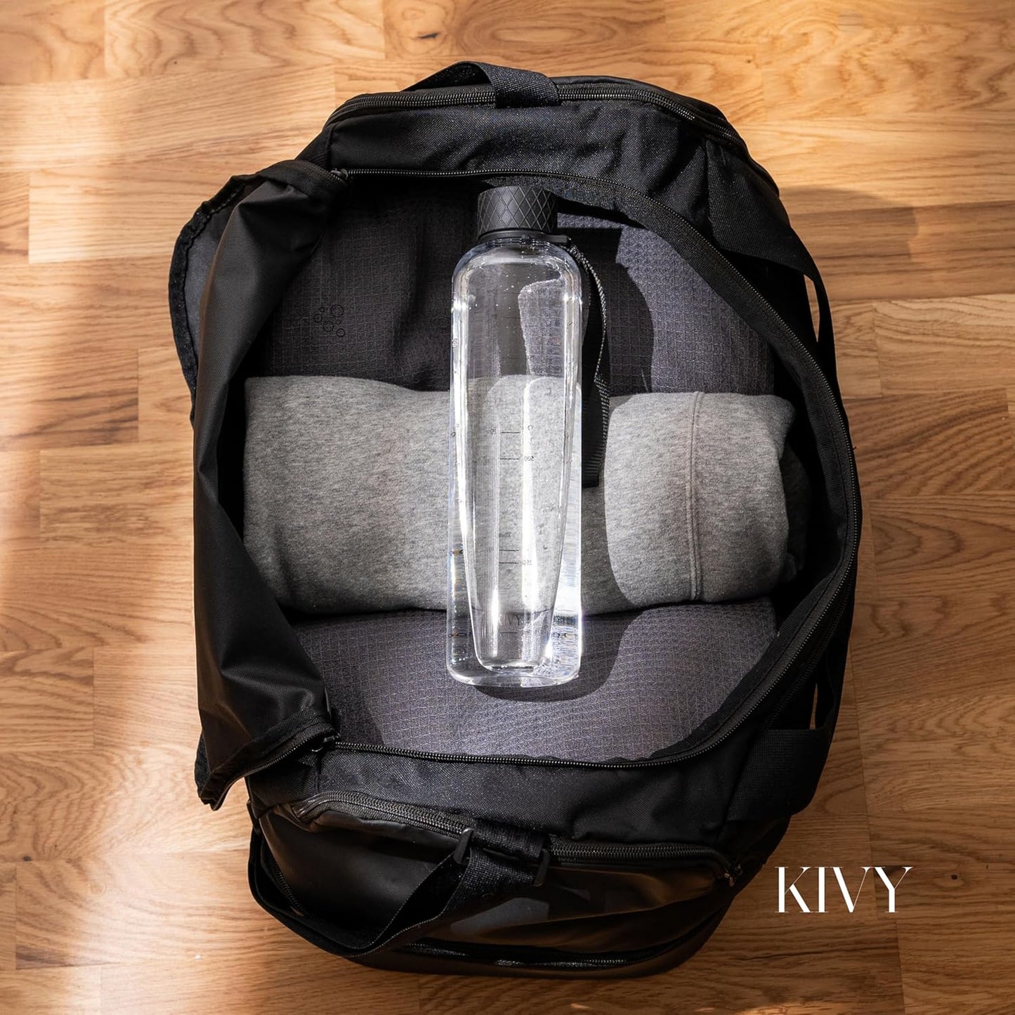 KIVY Slim Water Bottle 32oz [Lightweight & Shatterproof] Fits Backpack & Cupholder for Travel, Sports, School, Gym - Clear water bottle with measurements - Transparent Tritan Black - Dishwasher Safe
