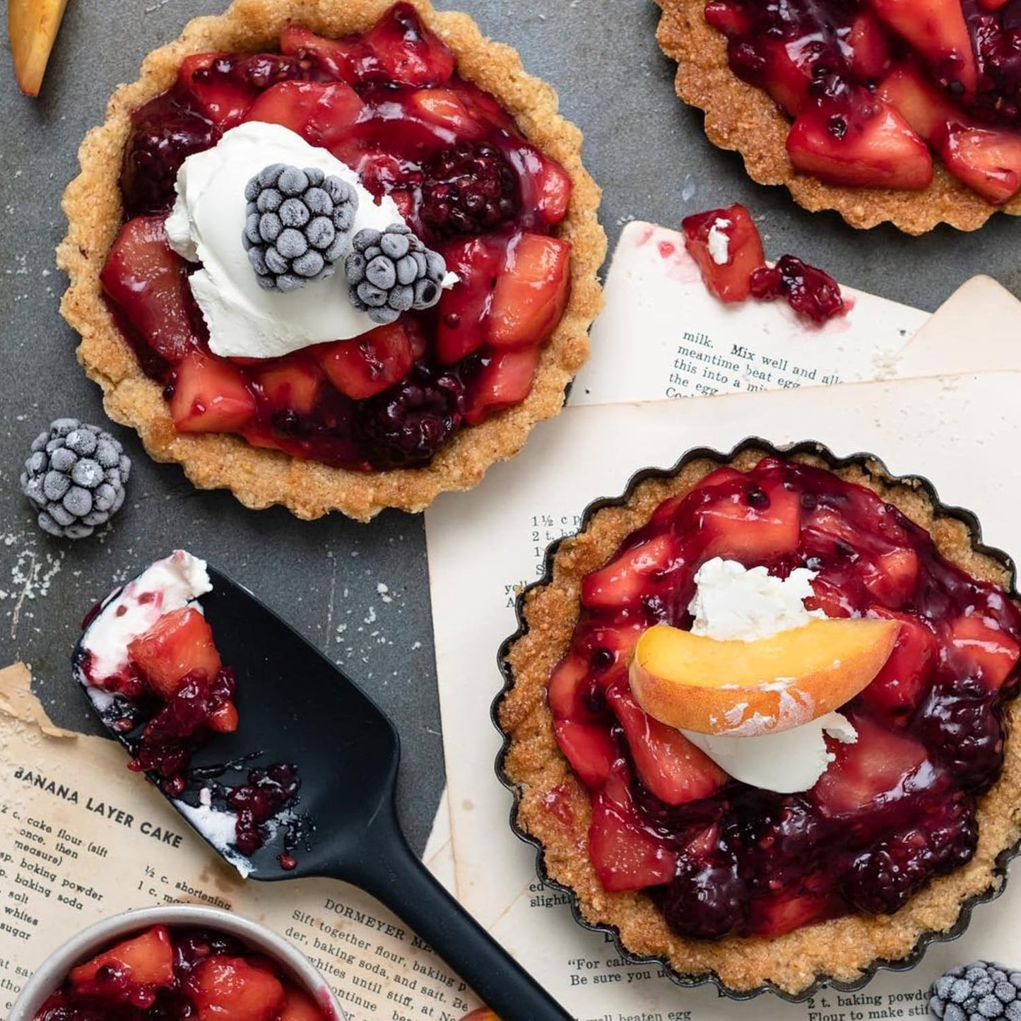 GIR: Get It Right Seamless Spoonula - Non-Stick Heat Resistant Silicone Scraper Spatula - Skinny Design for Mixing, Serving, Scraping, and Stirring - 11 In, Black